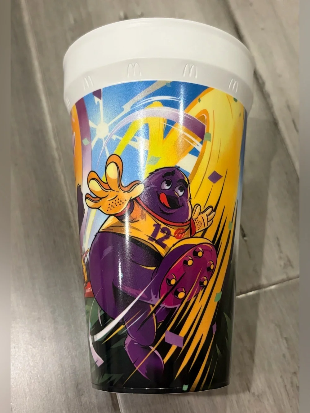 McDonald's White Cup with Purple, Orange and Green Soccer Design